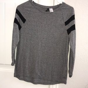 Cute and soft long sleeve top with sheer pieces!